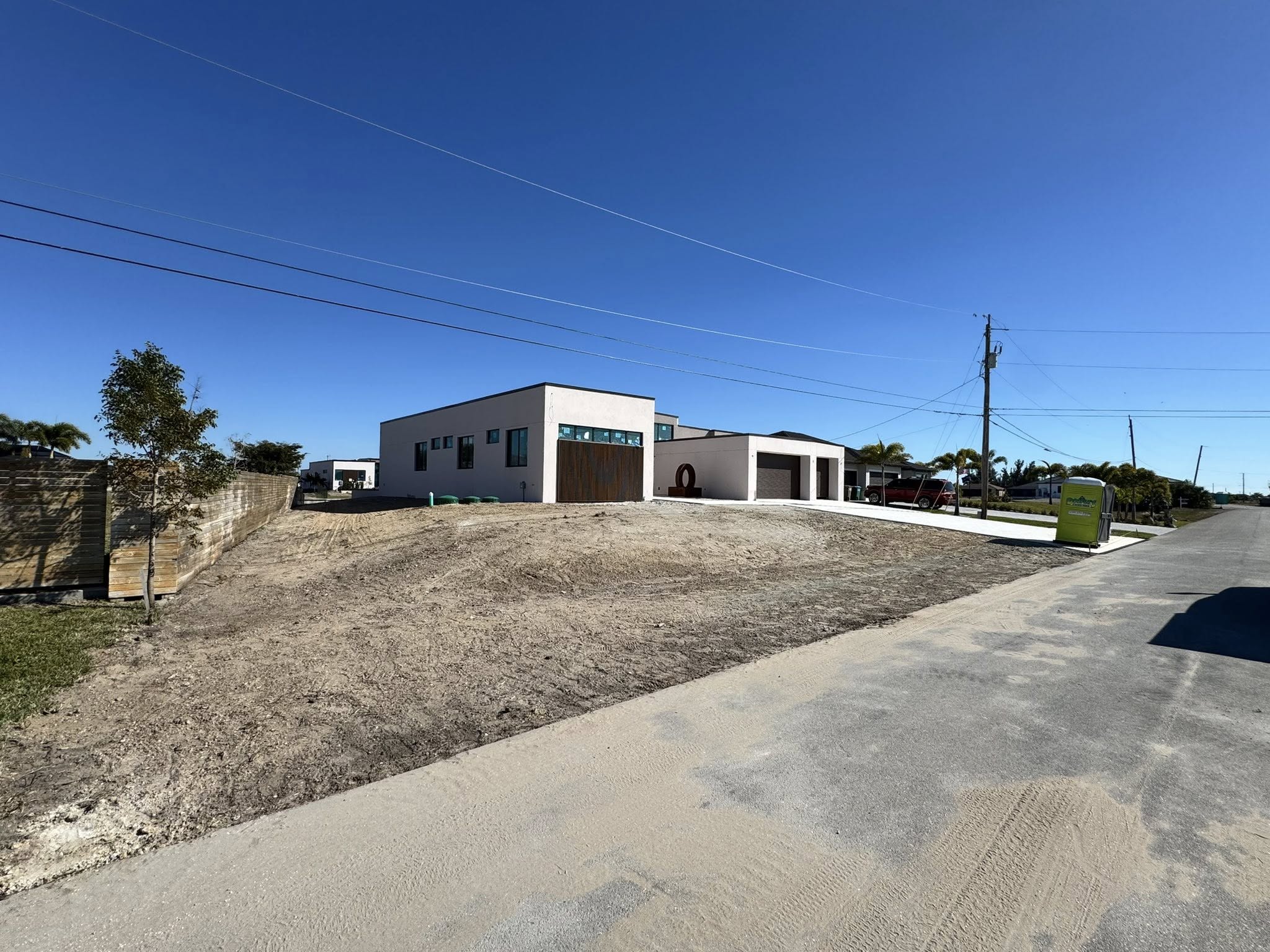 Completed site preparation and final grading for a new residential construction in Cape Coral